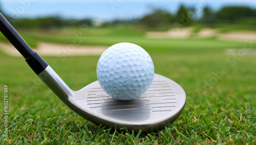 Golf ball and iron club on grass – pre-shot close-up. AI generated.