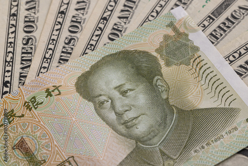 Wallpaper Mural Chinese Yuan Banknote with Mao Zedong Portrait on Background of US Dollar Bills Torontodigital.ca