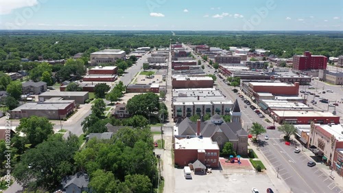 Afternoon sun shines on the historic buildings of downtown Emporia, Kansas, USA.