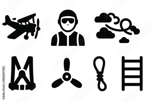 Stunt Flying Icons. Solid style icons of Stunt Flying: Plane, Pilot, Harness, Goggles, Sky, Propeller, Safety Rope, Ladder, No
