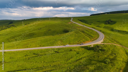 Photos Drone flight over a motorhome in the Caucasus Mountains at sunset