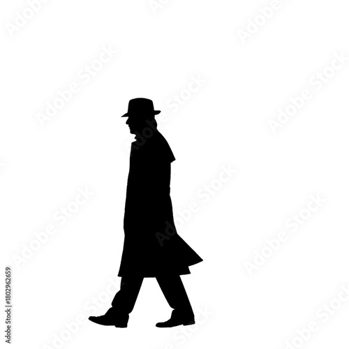 Silhouette of a man in a hat and coat walking with a white background in a full body side view shot