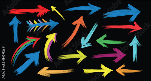 Collection of colorful abstract brush stroke arrows pointing in various directions on a black background