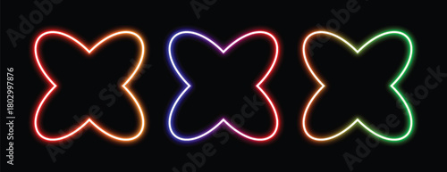 Three glowing neon butterfly shapes in vibrant red orange purple and green against a black background