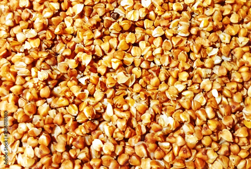 A close-up macro photo of cooked buckwheat grains