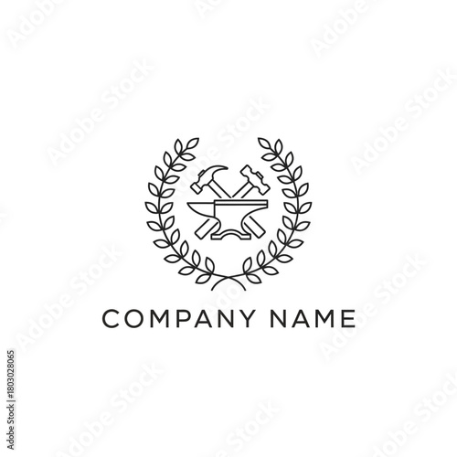 Vintage blacksmith logo with crossed hammers and anvil in a laurel wreath.