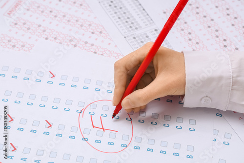 Female teacher writing resu...