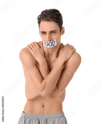 Young man with crossed out ...