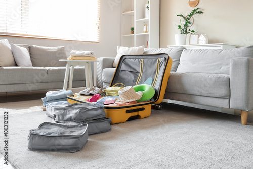 Open suitcase with organize...