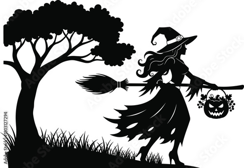 Black silhouette of a witch flying on a broomstick with a jack o lantern basket near a tree