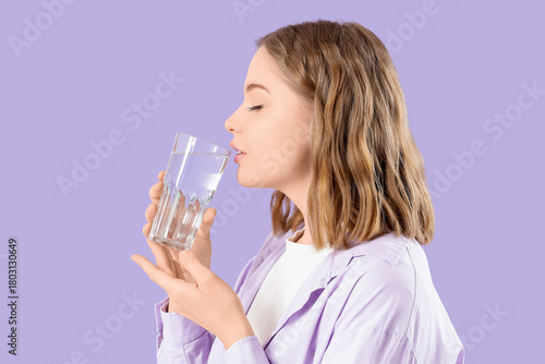 Young woman drinking fresh ...