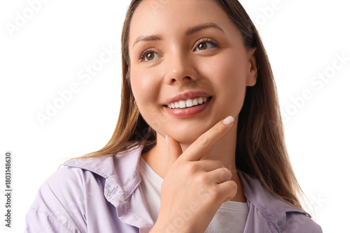 Dreamy young woman on white...