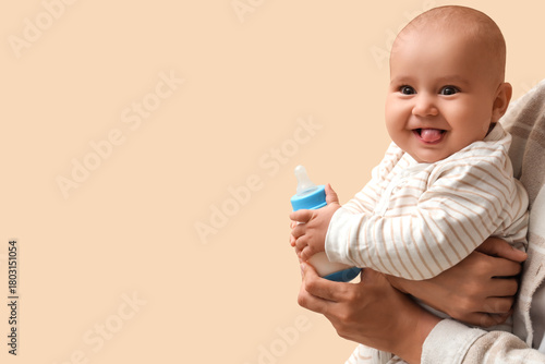 Mother with baby and bottle...