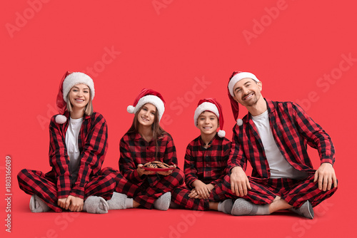 Happy family wearing matchi...