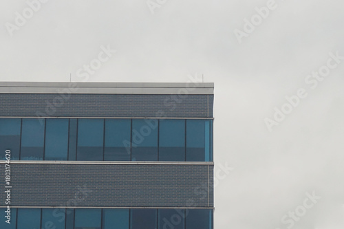 Corner of an Office Building Againt Gray Winter Sky