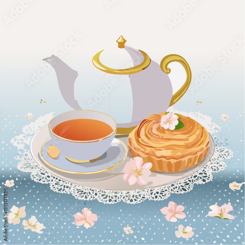 A delicate tea set with a pastry and floral decorations, perfect for a relaxing afternoon break