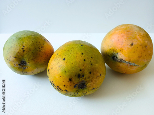 Wallpaper Mural fresh mangoes on table Torontodigital.ca