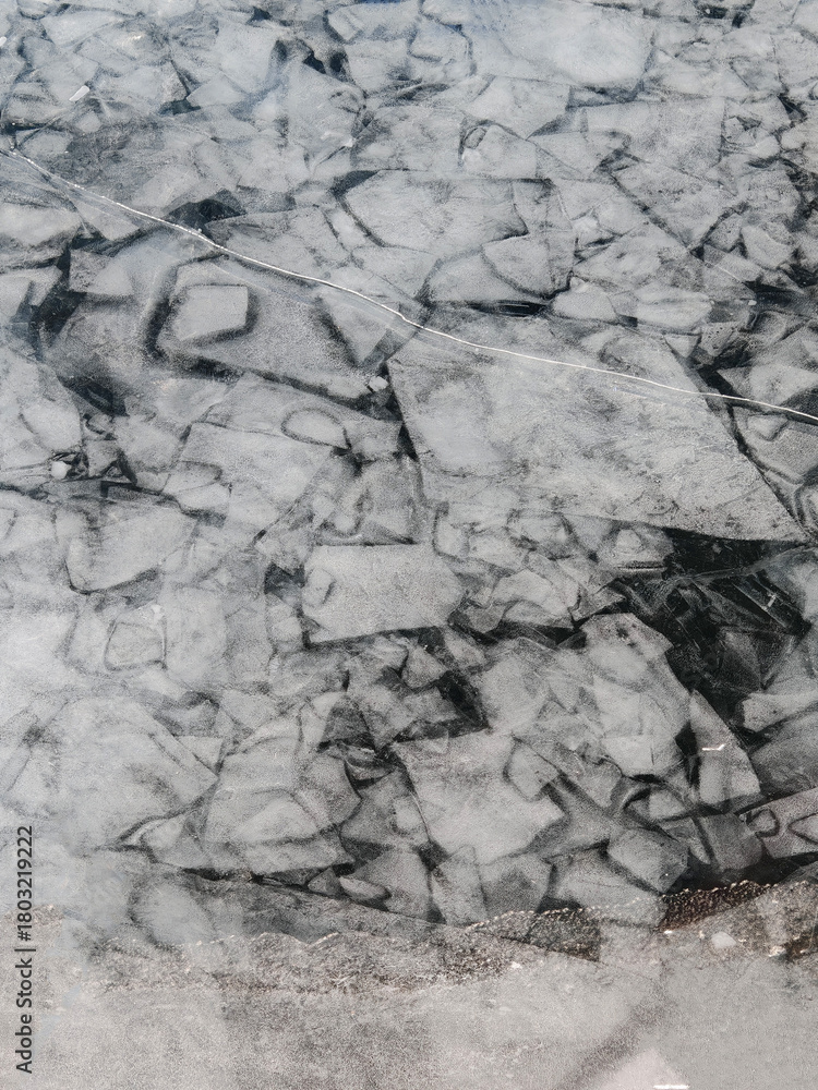 Fototapeta premium Endless hummock field on frozen Lake Baikal. Piles of snow-covered debris of blue ice on frosty day