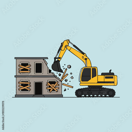 A powerful yellow excavator with a large bucket is actively engaged in the process of demolishing an old, dilapidated two-story house, creating dust and debris.