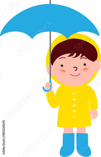 傘をさすレインコートの男の子
