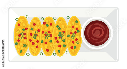 Delicious golden fried food with sauce on a white plate.