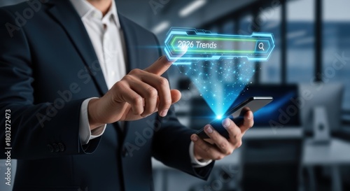 Wallpaper Mural Businessman Using Smartphone to Research 2026 Business Trends with Hologram Technology Torontodigital.ca