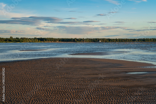 Fototapeta Naklejka Na Ścianę i Meble -  Sandy beach on the Baltic Sea coast on a sunny summer day, Sestroretsk, Kurortny District, Saint Petersburg, Russia