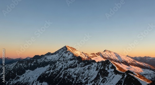 Wallpaper Mural Snow-capped mountains at sunset with a clear blue sky. Torontodigital.ca