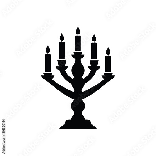 Candelabra with five lit candles in black silhouette.
