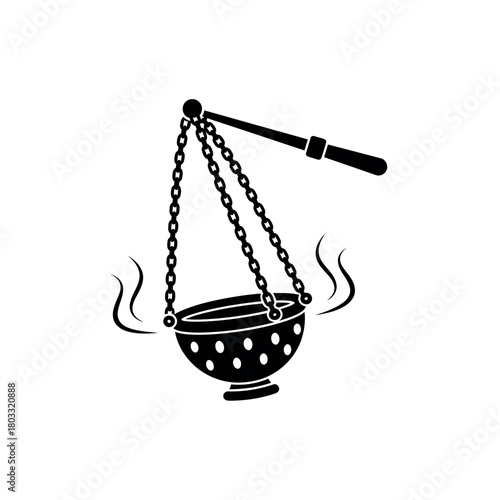 Incense burner with smoke.