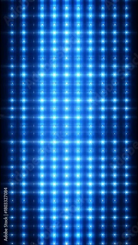 Abstract futuristic bright blue glowing light grid. An energetic disco background with vibrant flashing dots for digital technology and music