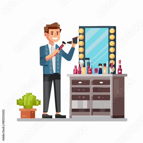 A smiling male makeup artist holding brushes and a palette in front of a brightly lit vanity mirror with various cosmetics.