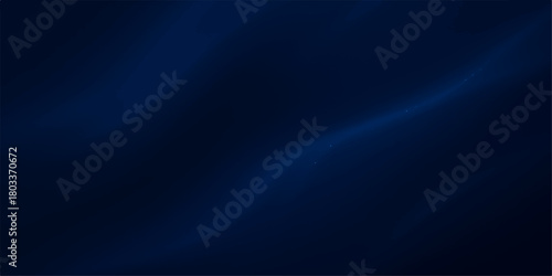 Blue abstract background with flowing waves and glowing light effects