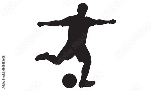 Dynamic silhouette of a soccer player kicking a ball