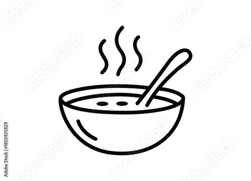 Bowl of steaming hot soup with spoon ready to eat nutritious meal comforting and warming food concept