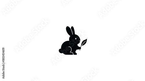 Black silhouette of a cute bunny icon holding a leaf, symbolizing cruelty-free, organic, and natural products vector