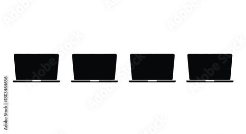 Four black laptops for technology concept