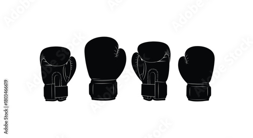 Four black boxing gloves for sport and fitness