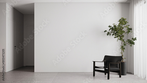 The minimal living room and black armchair and empty white wall background. 3d rendering