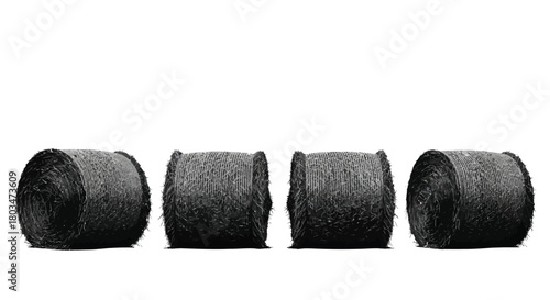 Four hay bales in a row