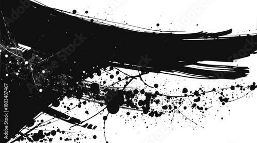 Abstract black ink brush strokes and splatters on a