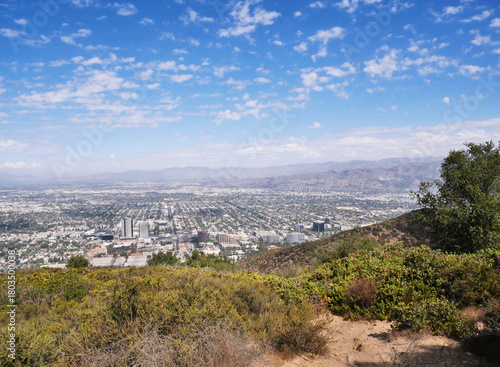 Skyline of Burbank as seen from the top of the Wisdom Tree hiking trail during a summer season in Los Angeles, California, USA