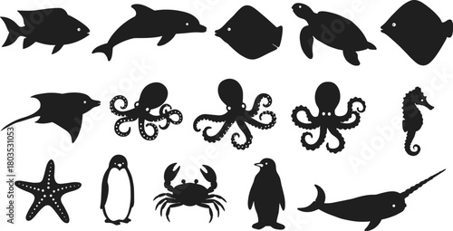 Marine animal silhouette collection featuring fish, dolphin, stingray, turtle, octopus, seahorse, starfish, penguin, crab and narwhal, perfect for ocean vector illustration projects