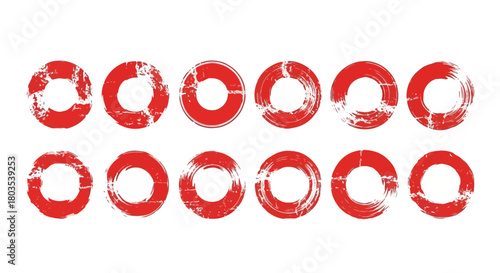 Collection of red grunge circles, isolated on a white background, representing abstract design elements