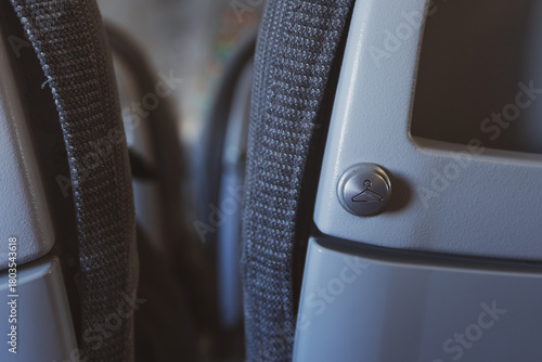 Hanging on the plane.