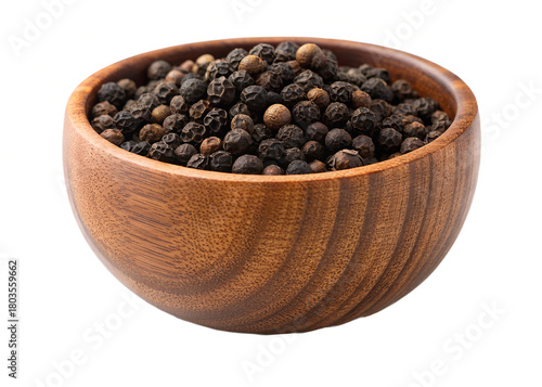 A rustic wooden bowl filled with aromatic black peppercorns, isolated on transparent PNG background.