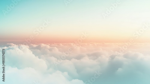 Fototapeta Naklejka Na Ścianę i Meble -  Pastel sunrise colors painting a calming cloudscape horizon