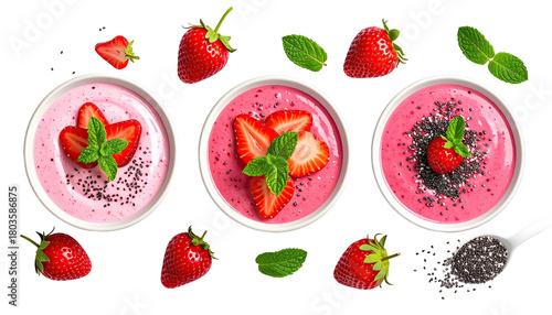 Three bowls of pink smoothie, strawberries, & chia on black