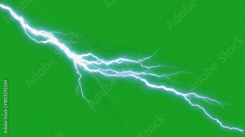 Bright white lightning bolt striking across a green screen background, symbolizing power and energy