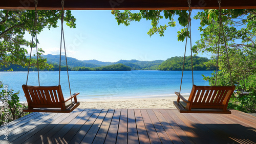 Romantic beachfront retreat with wooden swings overlooking calm blue sea and lush green islands